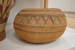 A West African pottery vase, various bowls and carvings. Conditon - fair to good